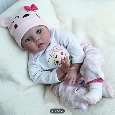 Rozkošná panenka Rebirth Girl v růžové a bílé, délka 50 cm