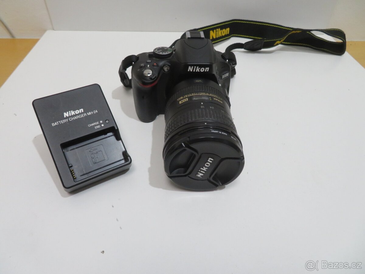 Digitální fotoaparát Nikon D5100 (Závěrka 4376) + objektiv