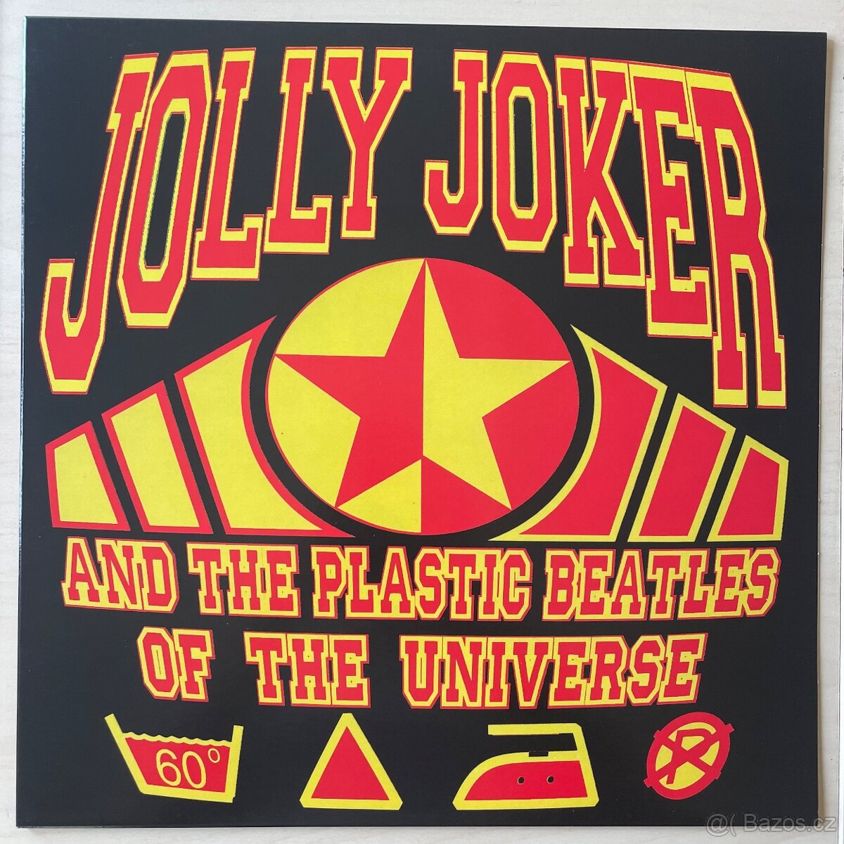 Jolly Joker And The Plastic Beatles Of The Universe – Heavy