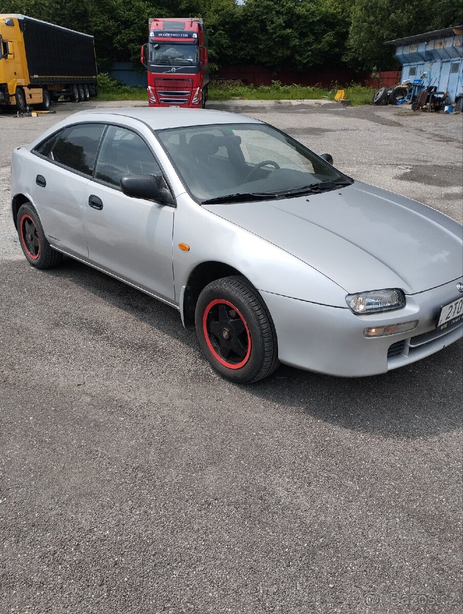 Mazda 323F 1,5benzín,65kwl