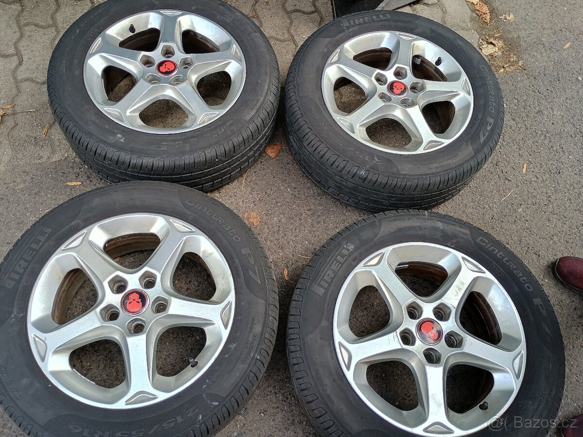 Pneu ko.5x108 16 ET52,5 Originál alu disky Ford,i na Volvo