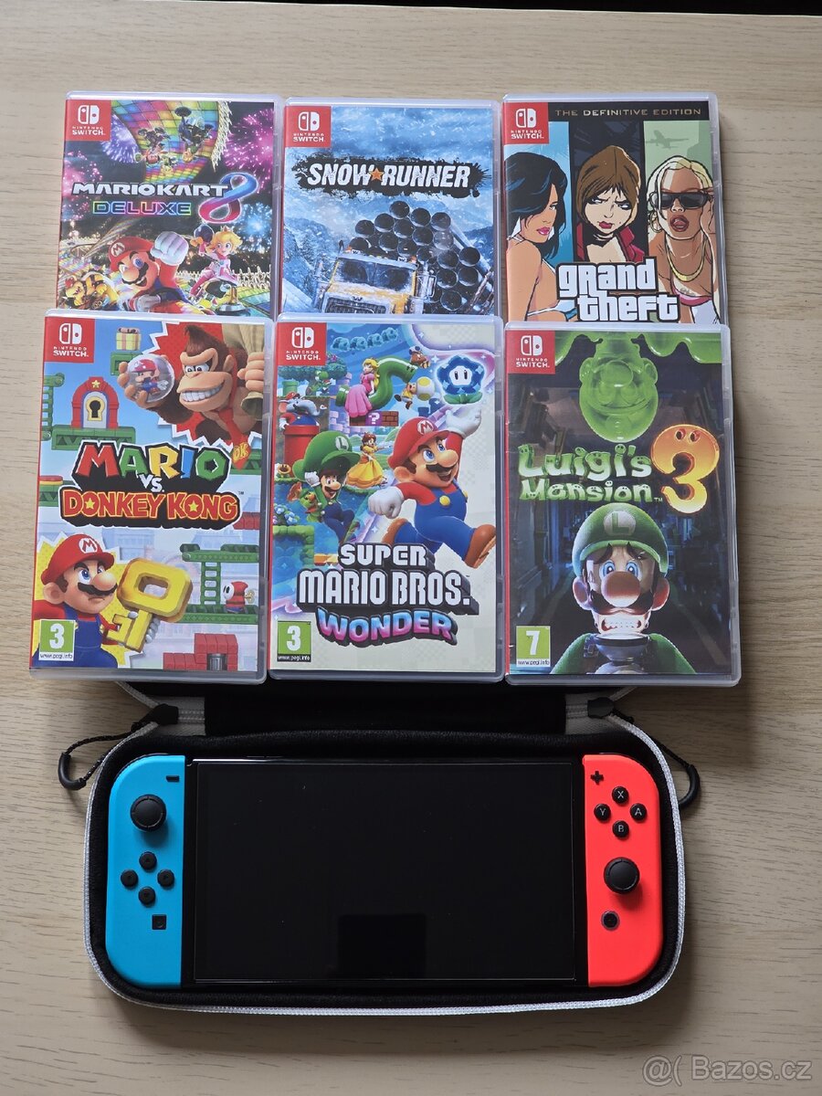 Nintendo Switch Oled + 6 her stále v záruce