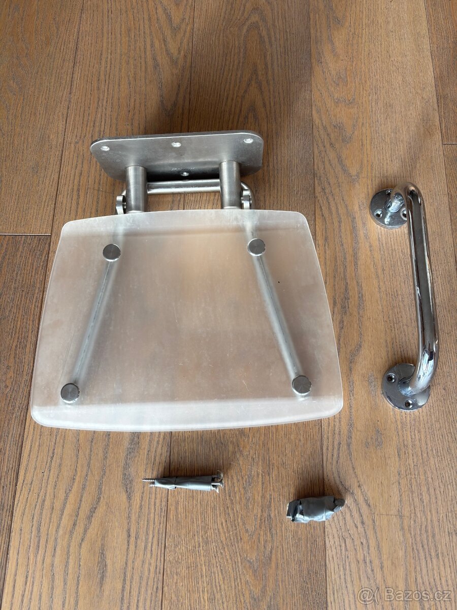 Sprchové sedátko Ravak, sklopné, průsvitně bílá + madlo.