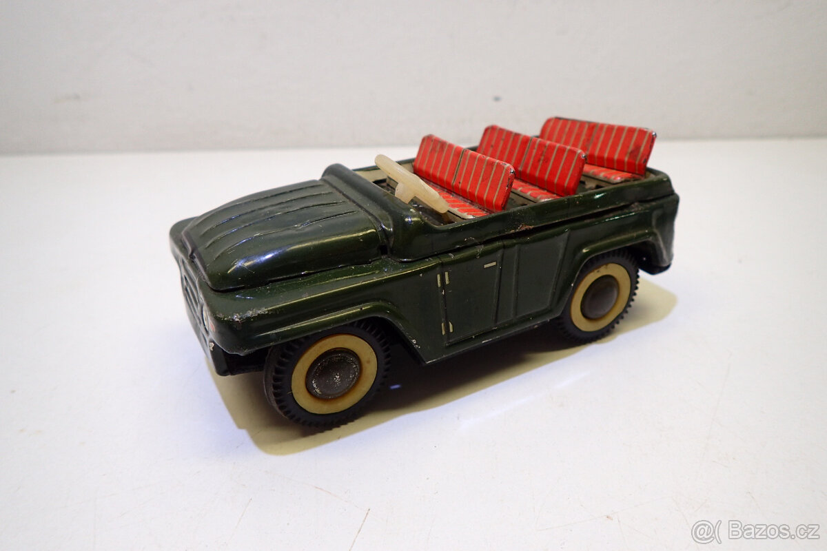 Vojenský džíp - autíčko na setrvačník - staré