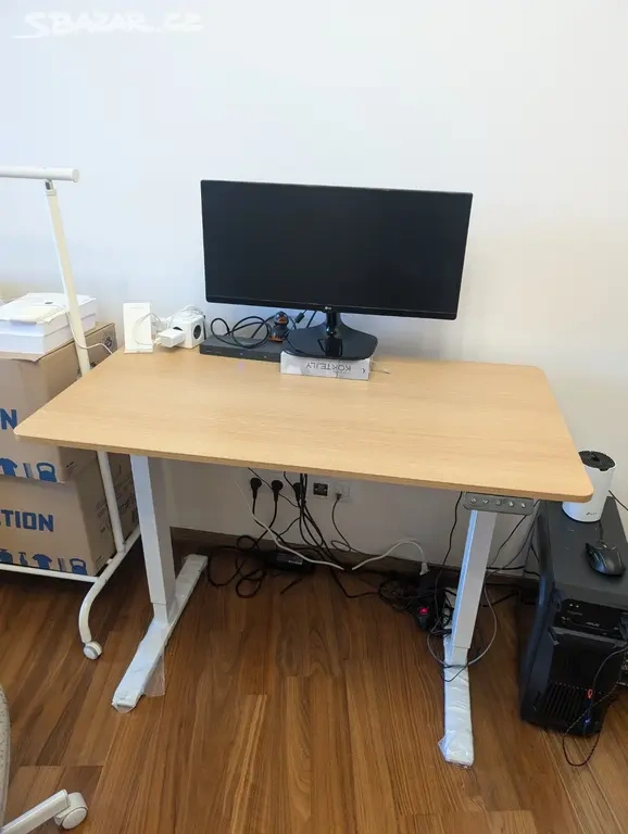 Výškově nastavitelný elektrický stůl (110 x 60 cm)