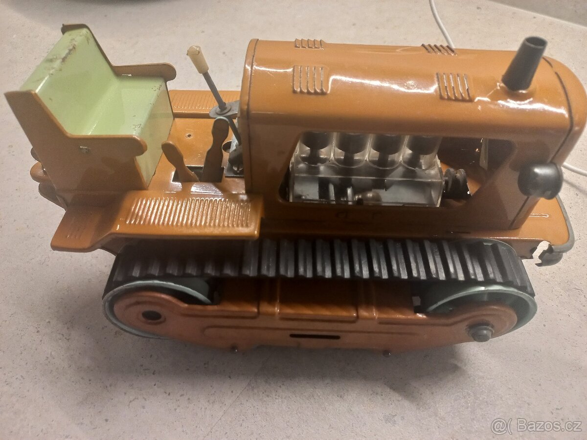 Stará plechová hračka