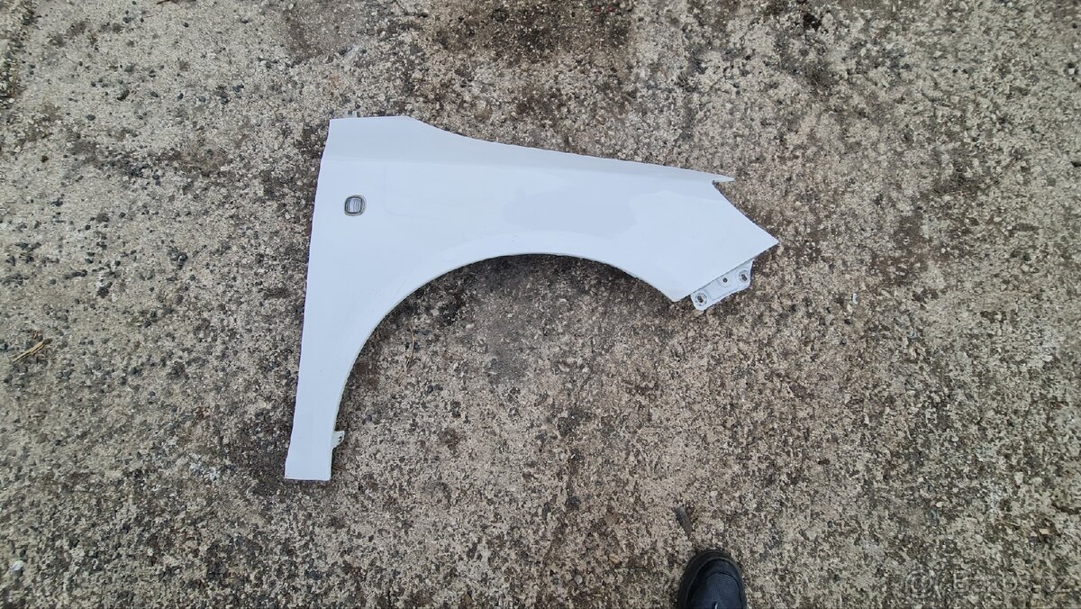 Fabia 2 - Pravý blatník kód 1026