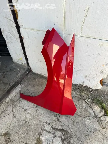 Levý přední blatník Fabia III červená LF3K,bez nutnos
