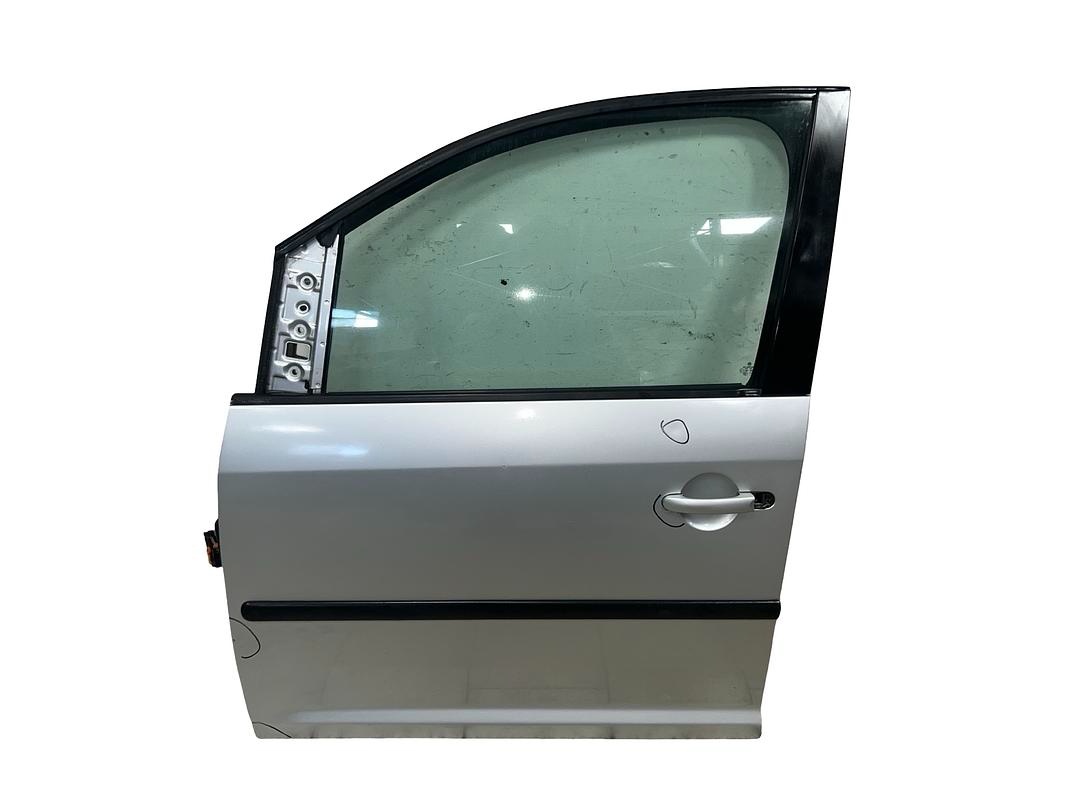 Levé přední dveře stříbrná metalíza LA7W VW Caddy 2k 2008