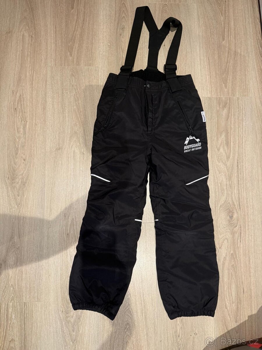 Oteplovací lyžařské kalhoty vel 134