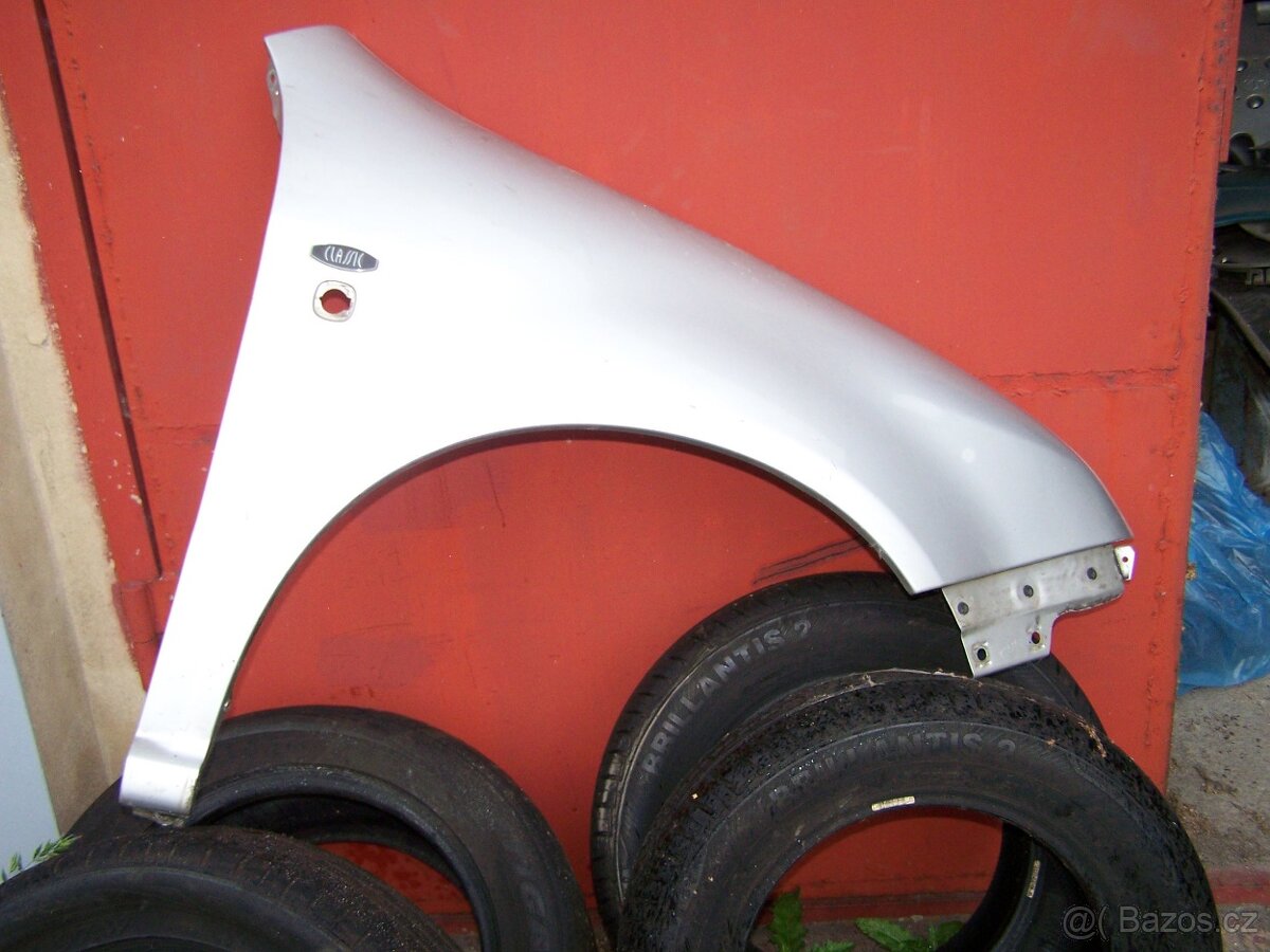 Levý přední blatník Škoda fabia 1