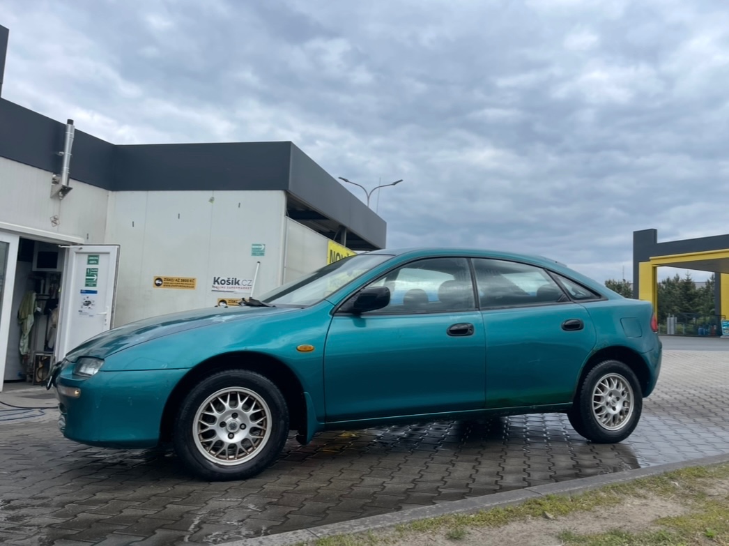 Mazda 323f 1.5 65 KW DOHC. Klima, el.okna, ALU kola