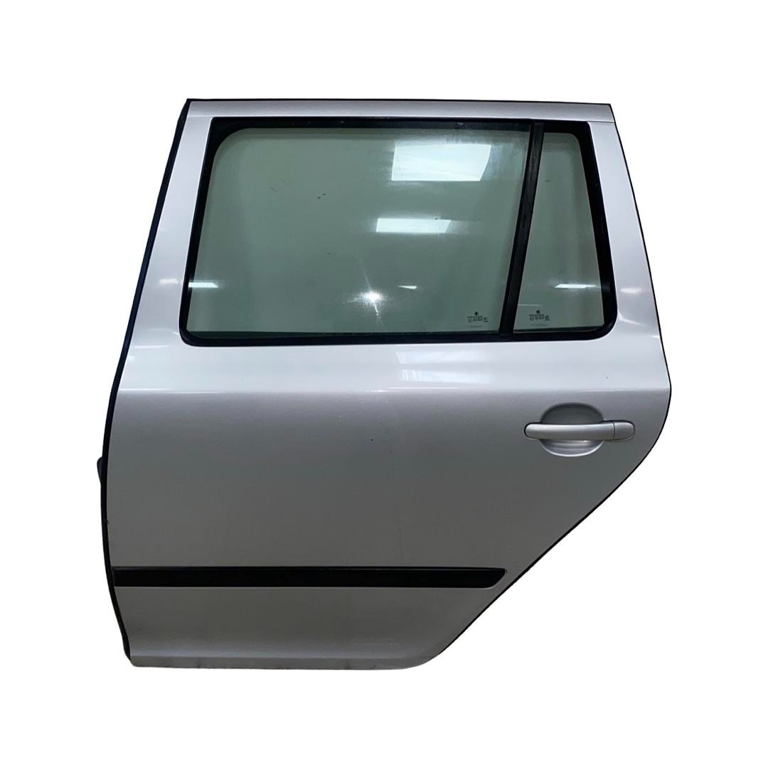 Levé zadní dveře stříbrná metalíza LA7W Škoda Octavia 2 2008