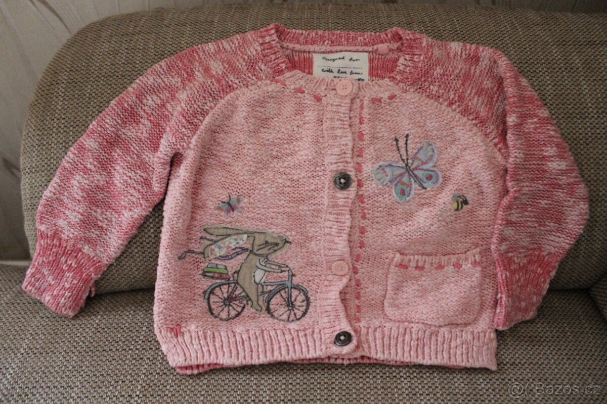 svetr se zajícem na kole Next