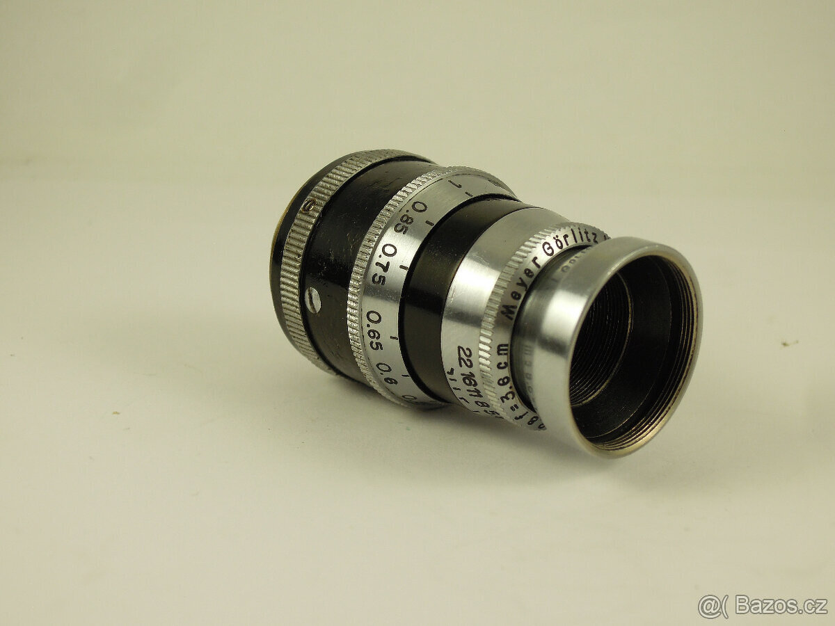 Koupím objektiv Trioplan 1:2,8 f=3,6cm