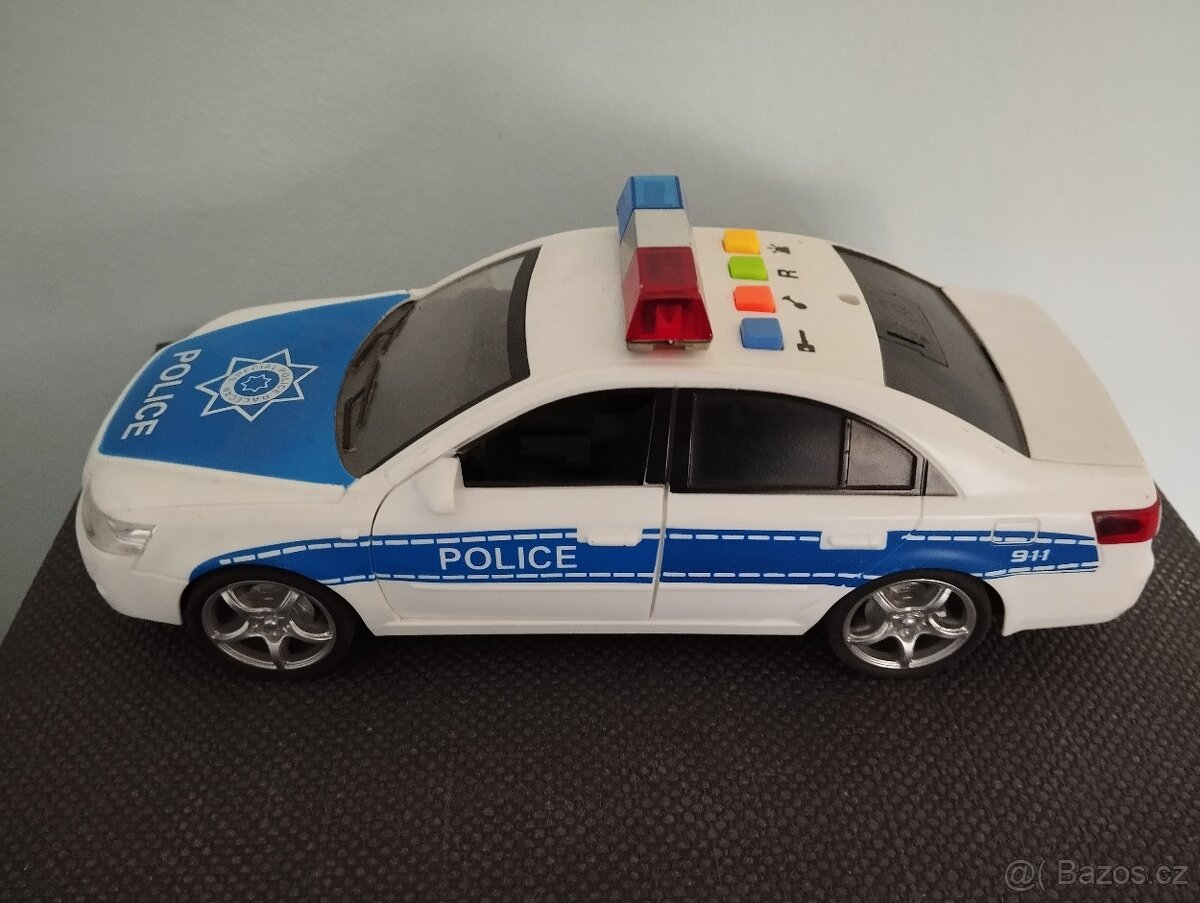Policejní auto s efekty 24 cm