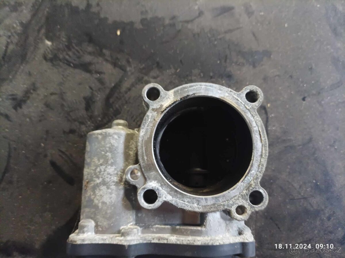 Hrdlo škrtící klapky - Seat Ibiza - 1,4 , 16v , 63kw.