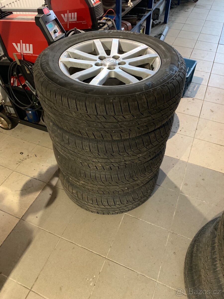 Celoroční pneu na alu kolech Suzuki Grand vitara