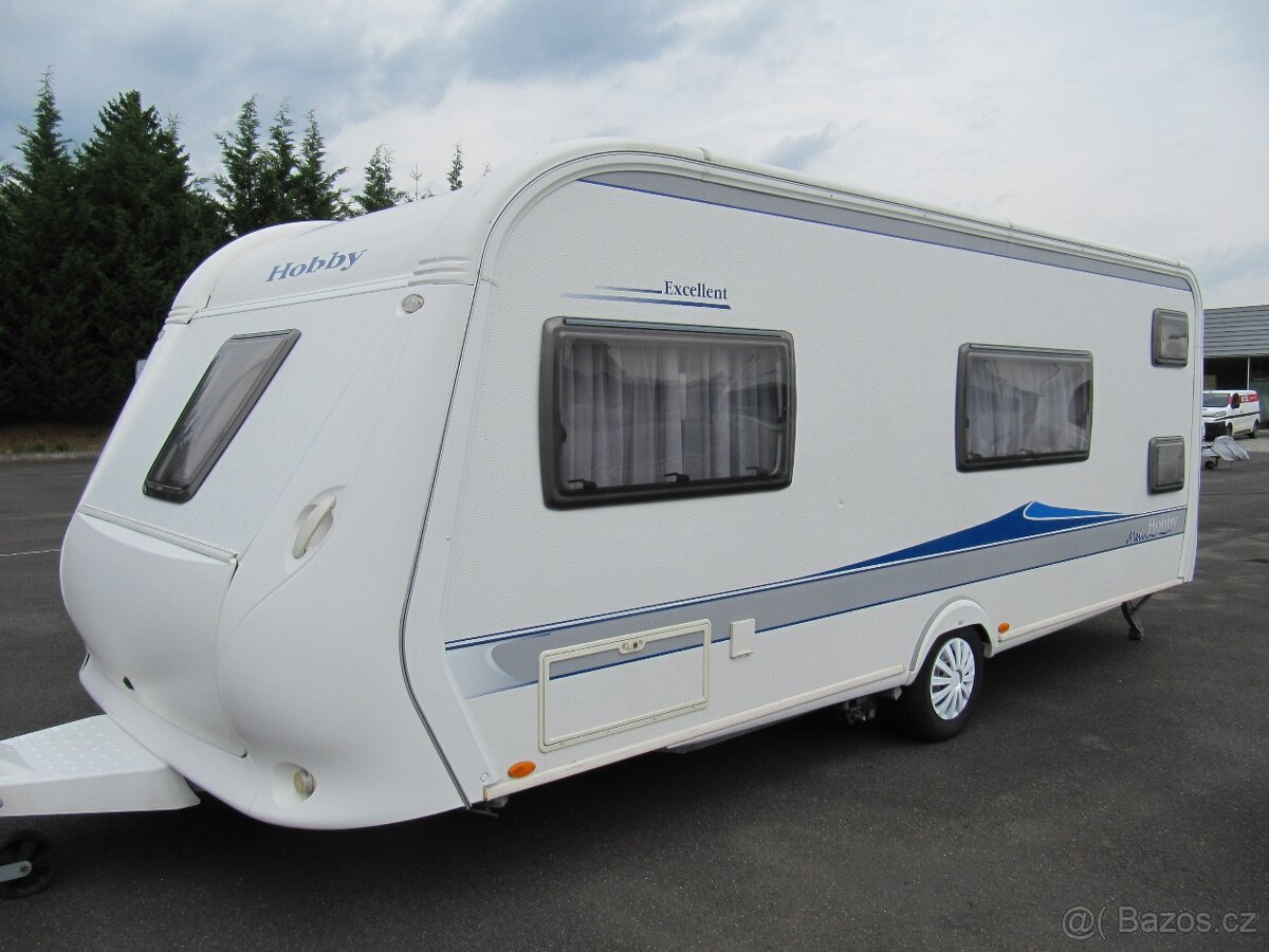 Prodám karavan Hobby 560 kmfe,,r.v.2009 + mover + markýza.