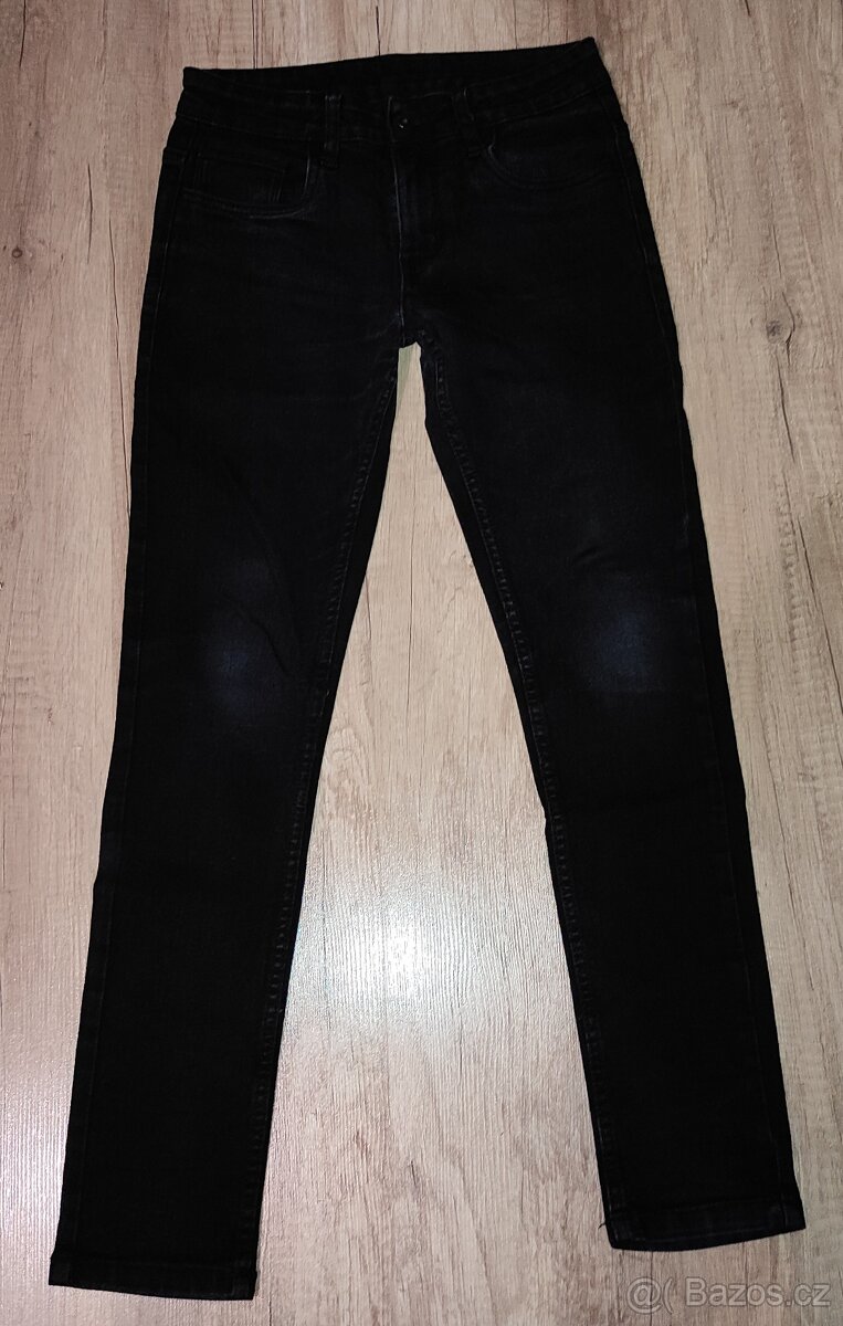 Černé rifle zn. C&A vel. 152