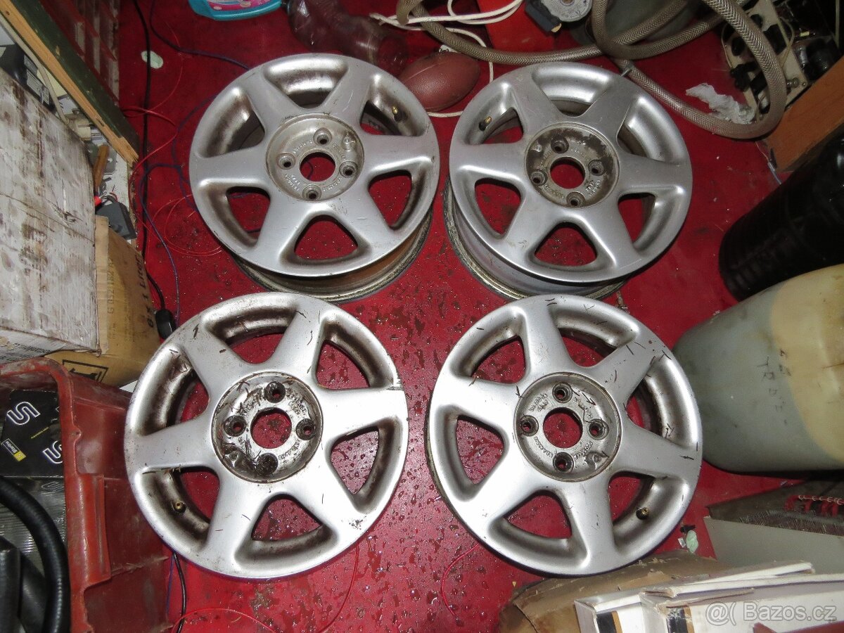 Disky kola 4x100 R14 VW Golf/Jetta MK2 vč. krytek