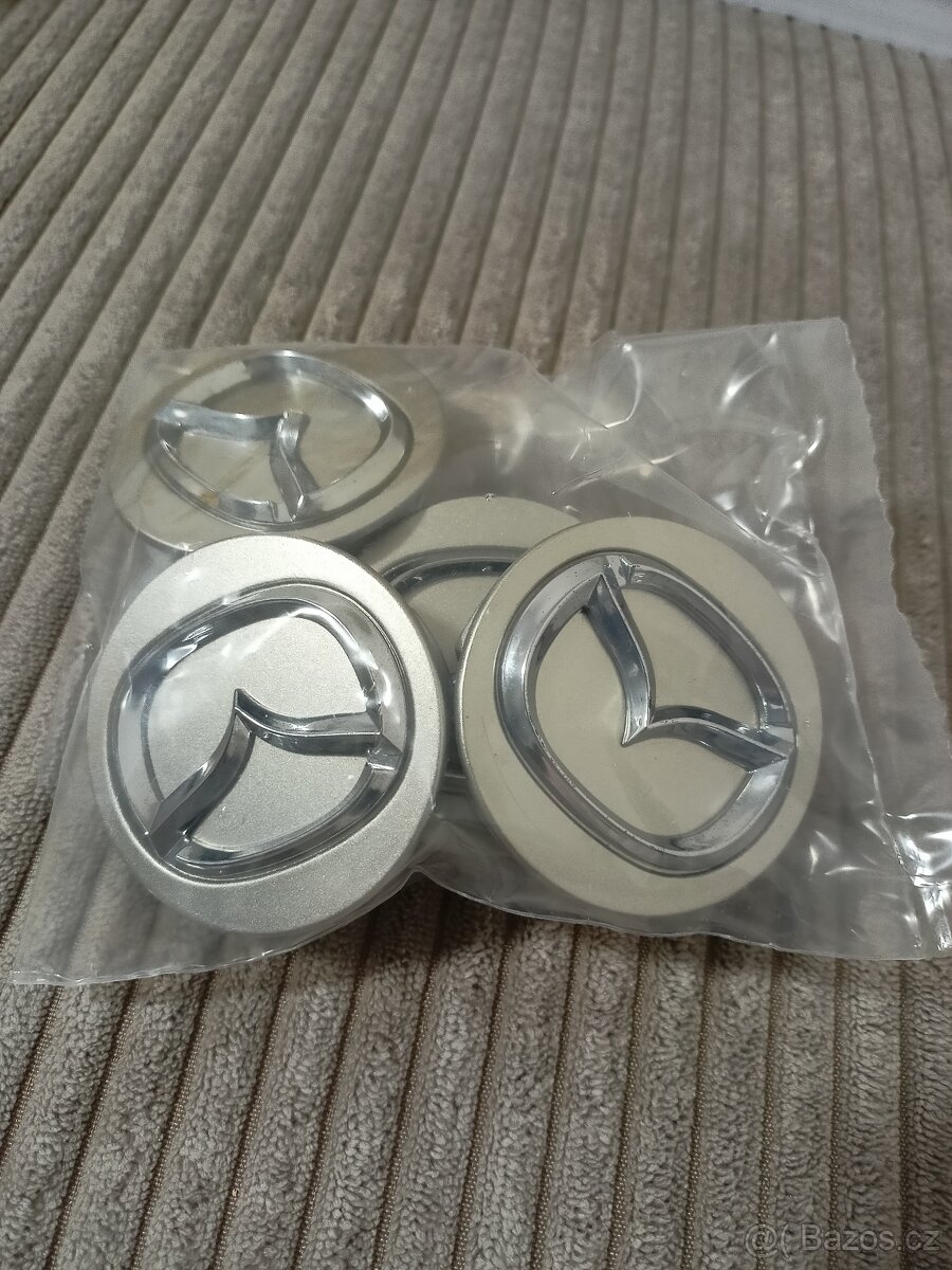 Středové krytky Mazda
