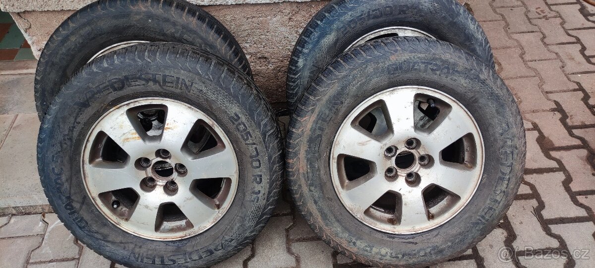 Alu kola Forester R15-celoroční pneu