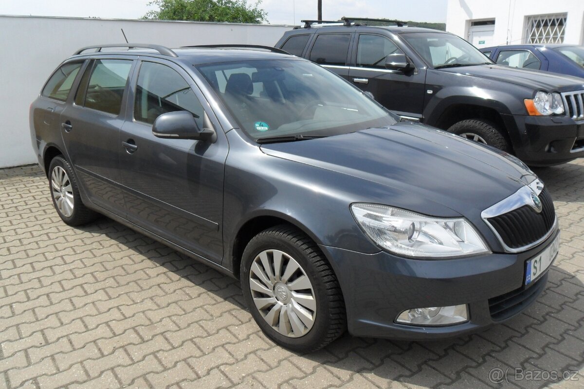 Škoda Octavia com 2.0TDi//103kW, r. 12/2011. Serv.kniha