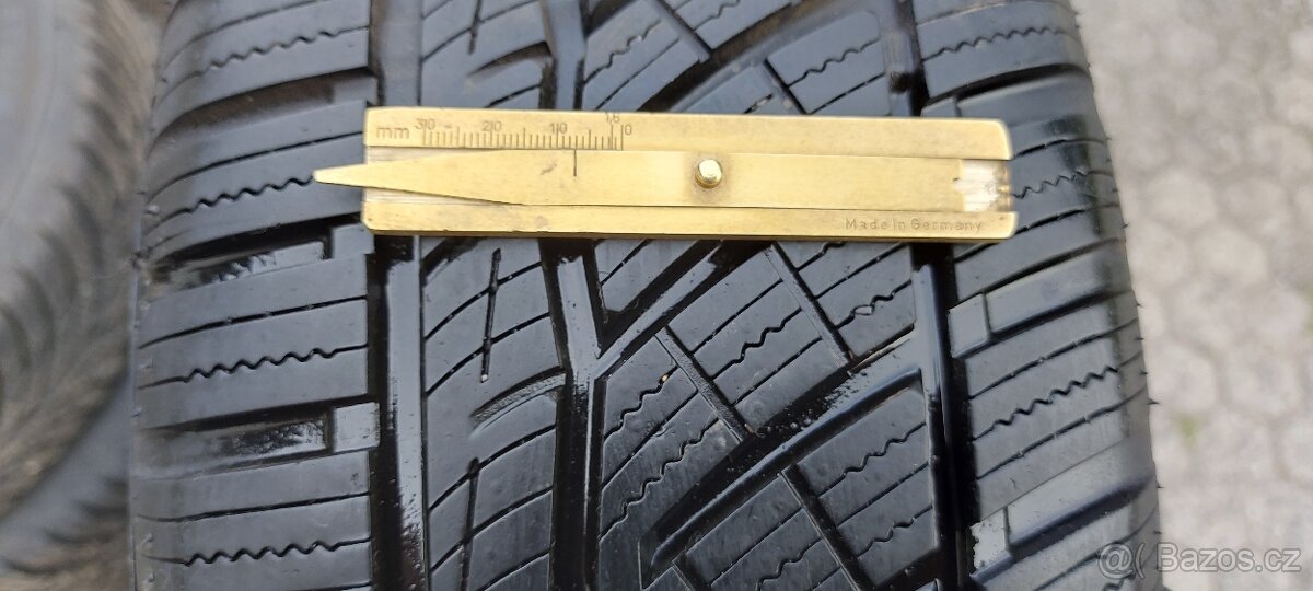 Celoroční pneu 185/60R14 Tomket (84)