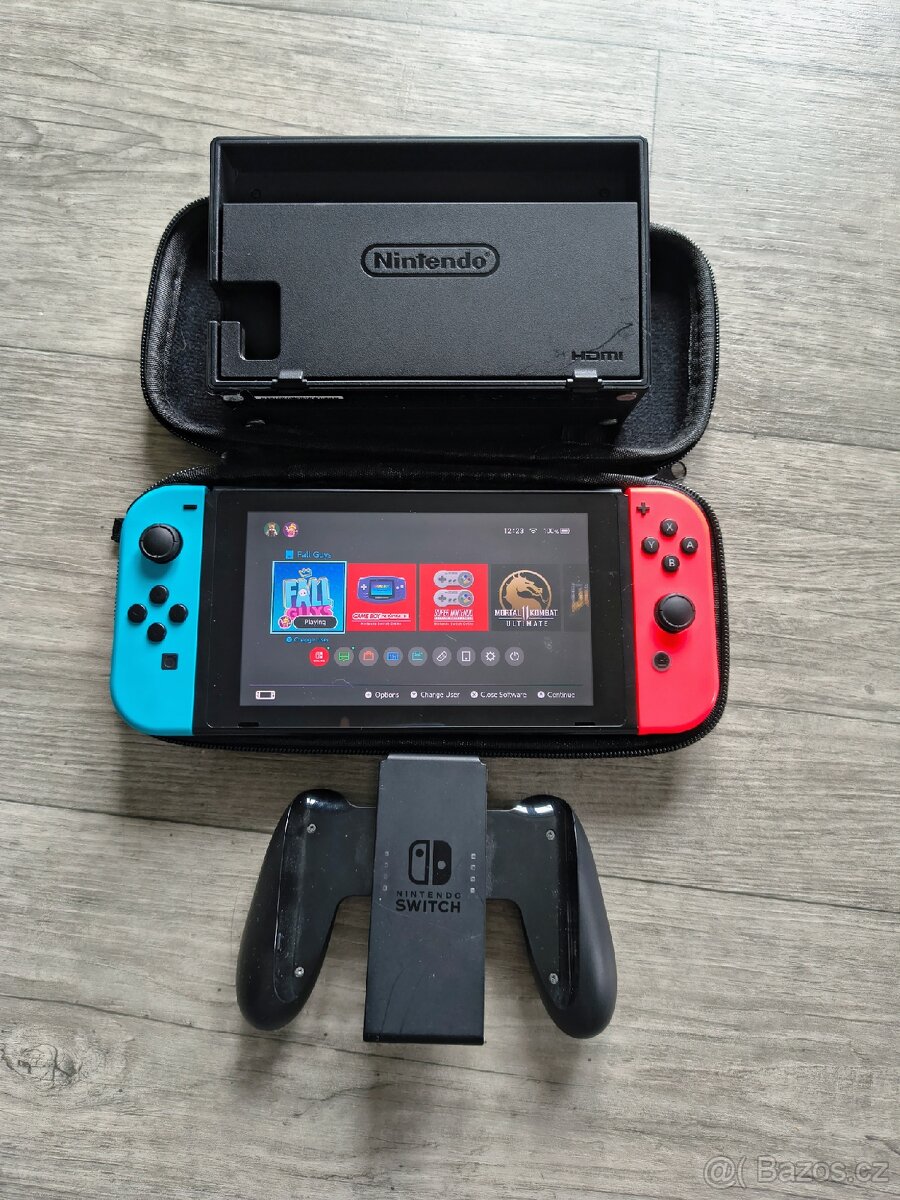 Nintendo switch + stanice + účet 29 her