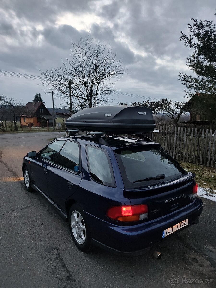 Pronájem - střešní box THULE