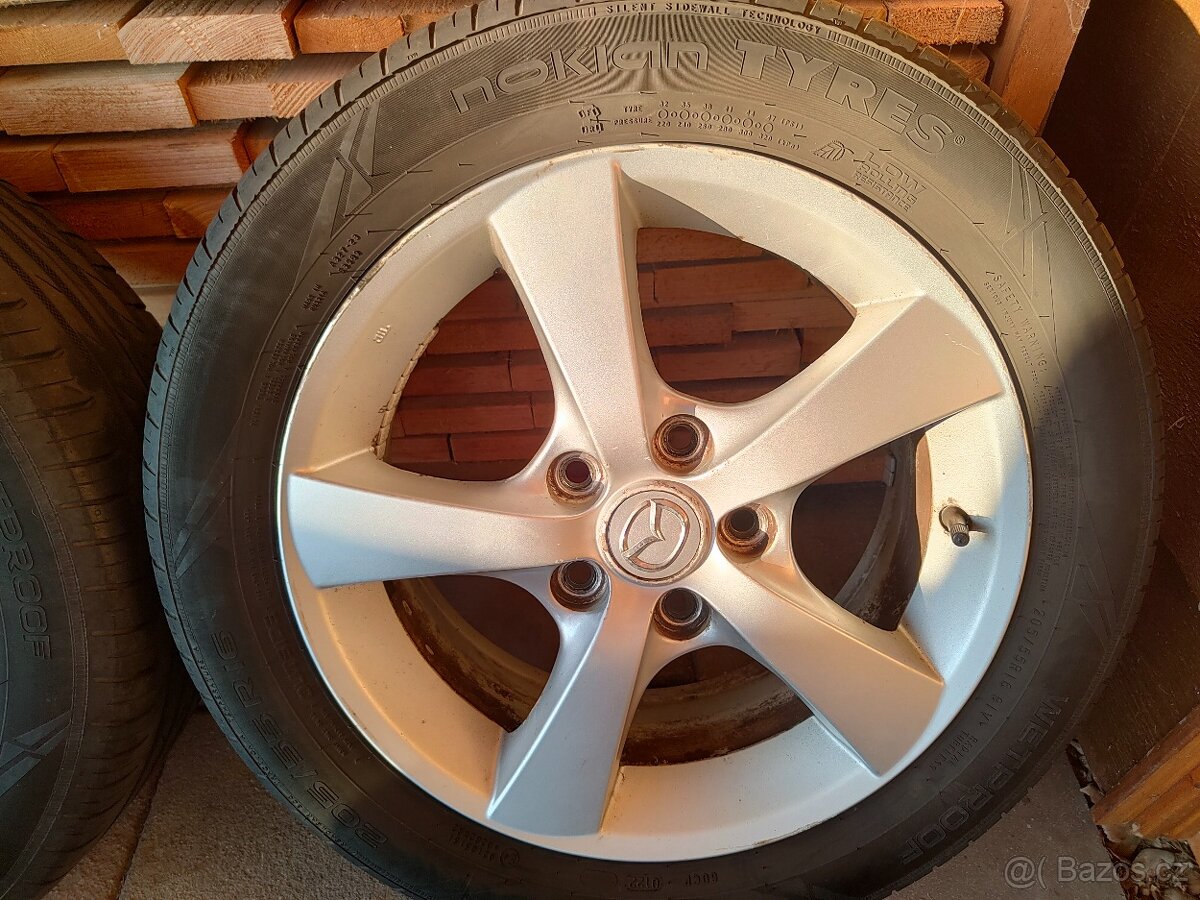 Kompletní originál letní kola Mazda3
