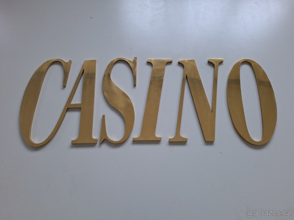 Nápis CASINO z mosazi