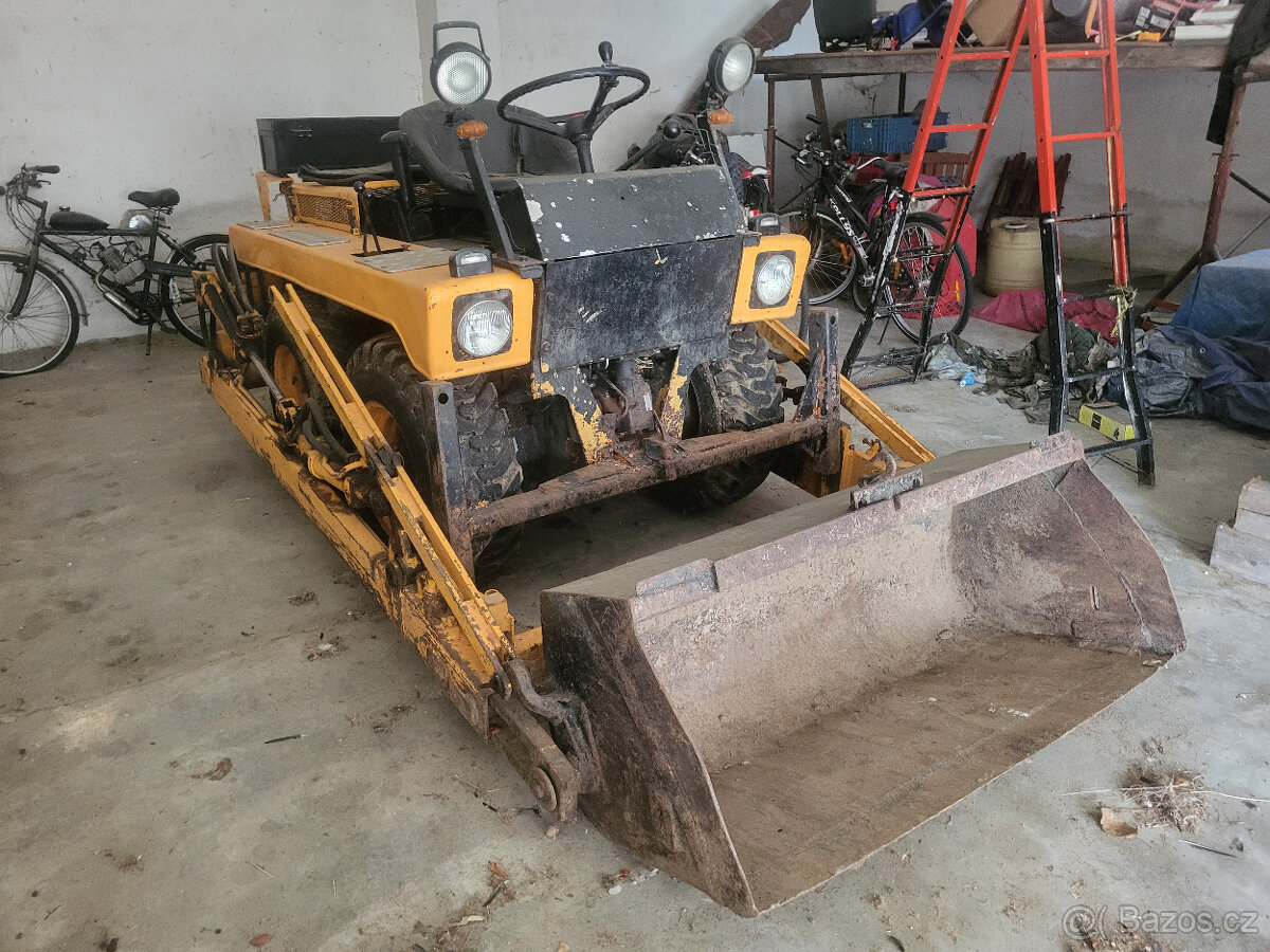 Prodám smykový nakladač