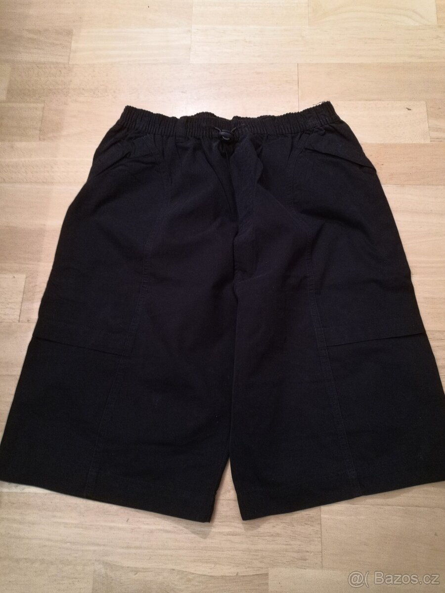 Prodloužené tmavomodré kraťasy do gumy, vel. 164