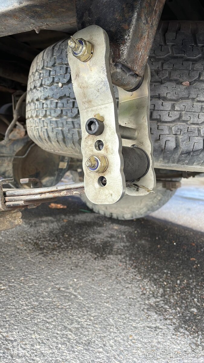 HOUPAČKA LISTOVÉHO PERA MITSUBISHI L200 PAJERO MONTERO