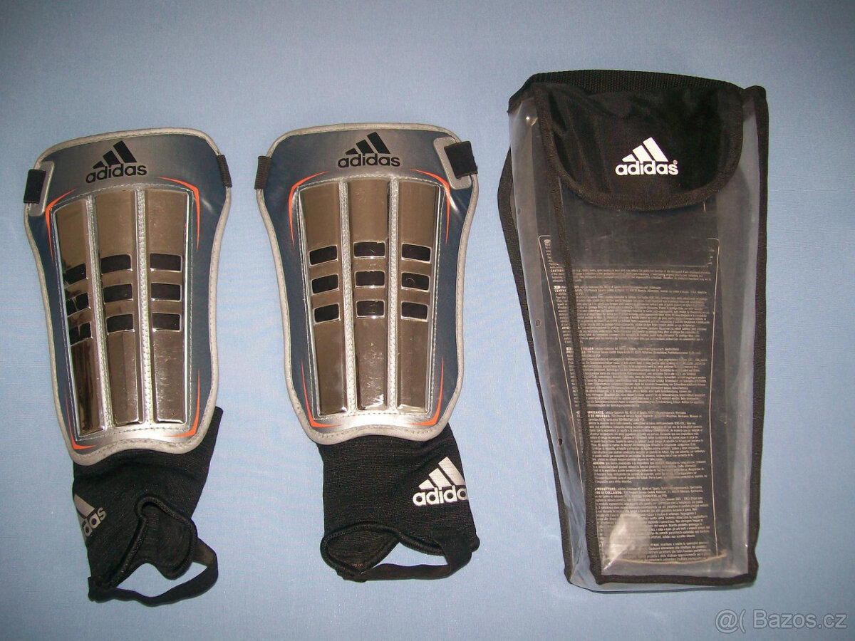Holenní chrániče ADIDAS - vel. M (160 - 180 cm)