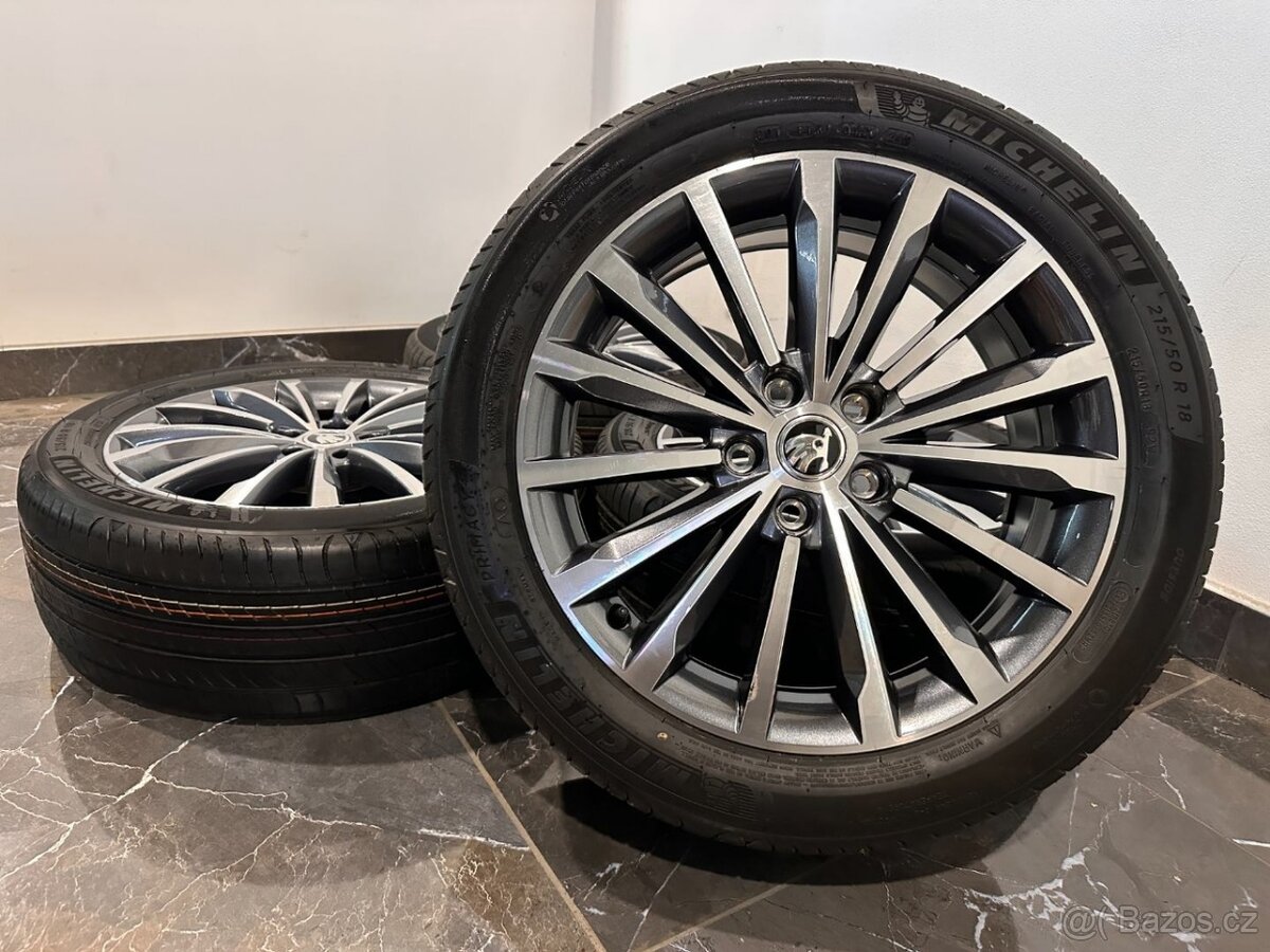 original alu letní škoda Karoq r18 Trinity