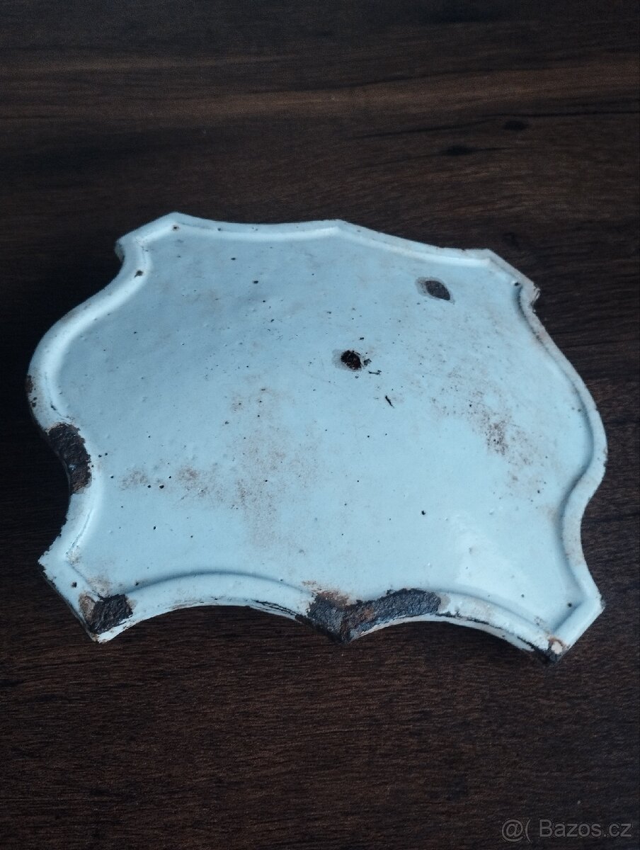 Starý litinový okrasný díl z kamen