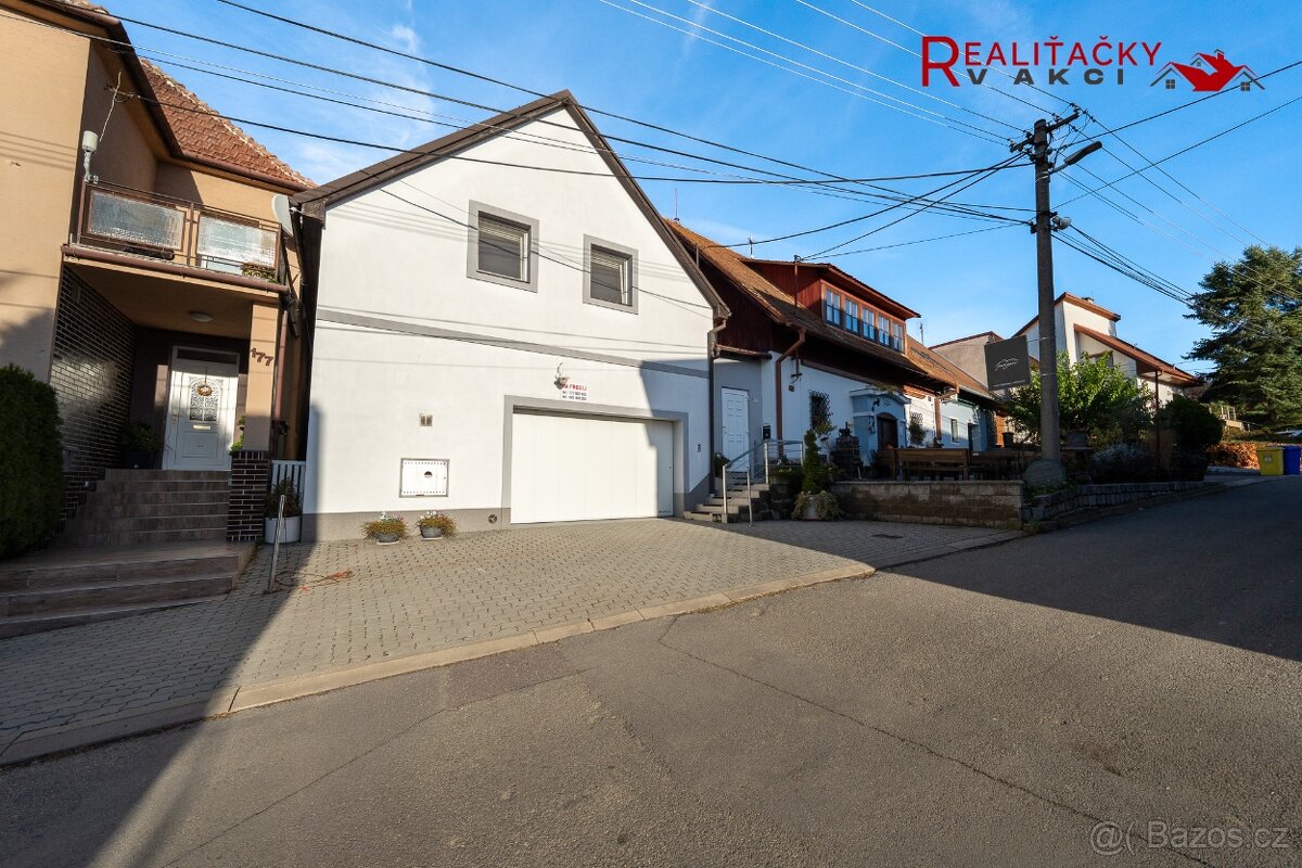 Rodinný dům s prostornou garáží, dílnou, vinným sklepem a vý