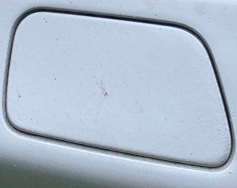 Prodám pravou krytku ostřikovače světla BMW E60 titansilber