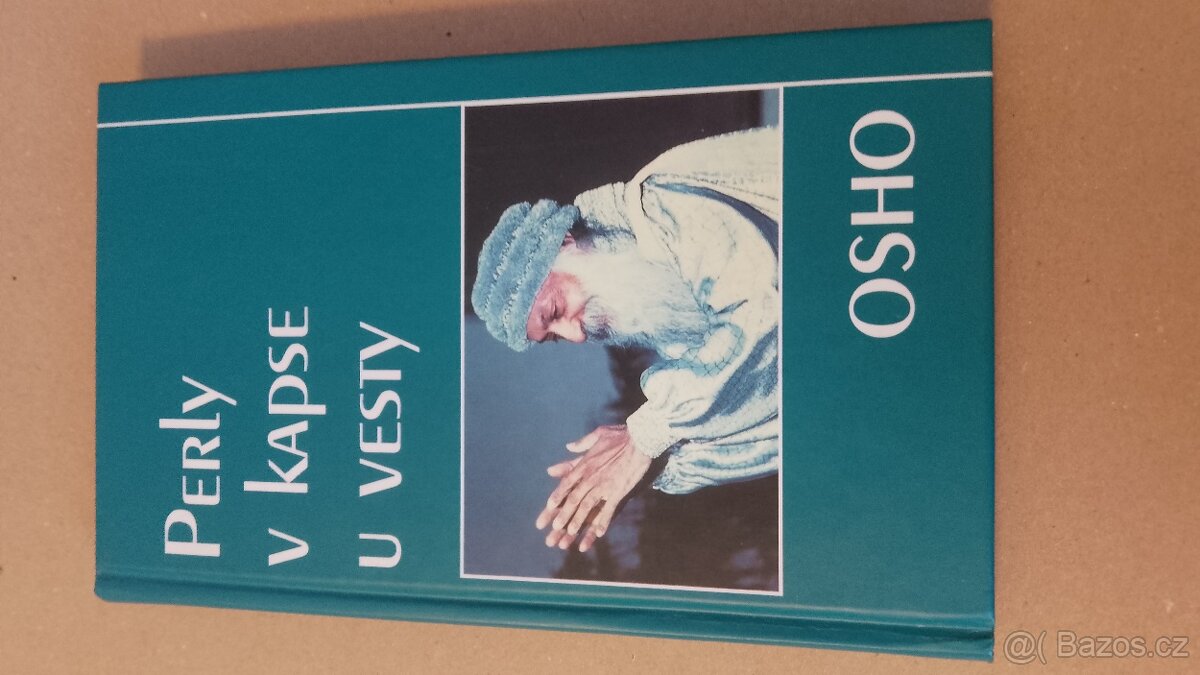 Osho.Perly v kapse u vesty