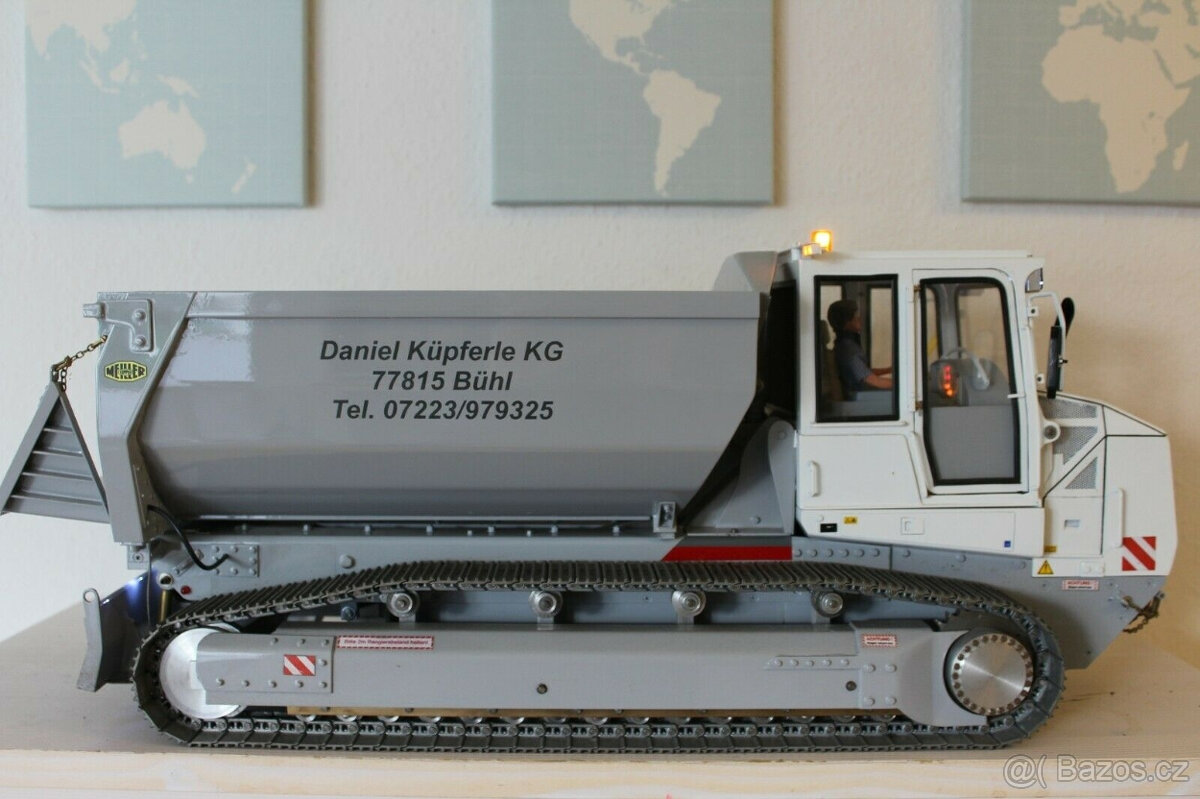 Pásový sklápěč Caterpillar 112