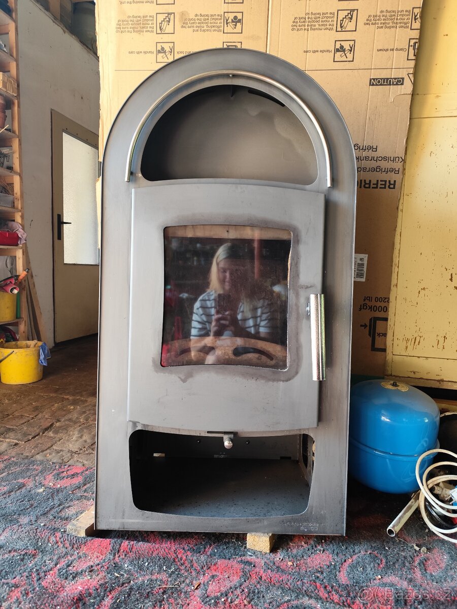 Krbová kamna Tanaga III (15kW) s výměníkem + radiátor