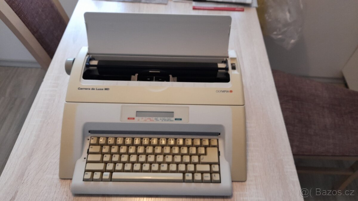 El.psací stroj s pamětí