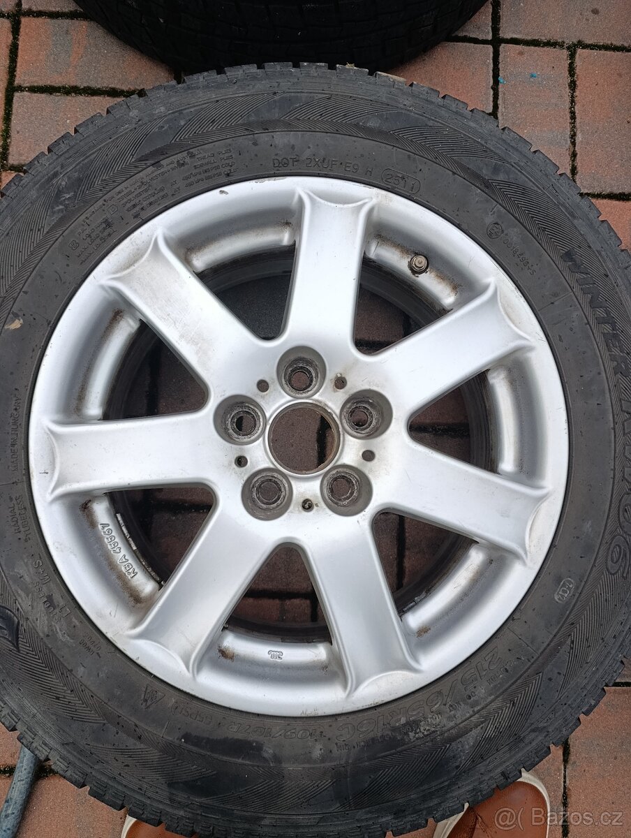 215/65R16 5x112 vnitřní průměr 57,1 mm