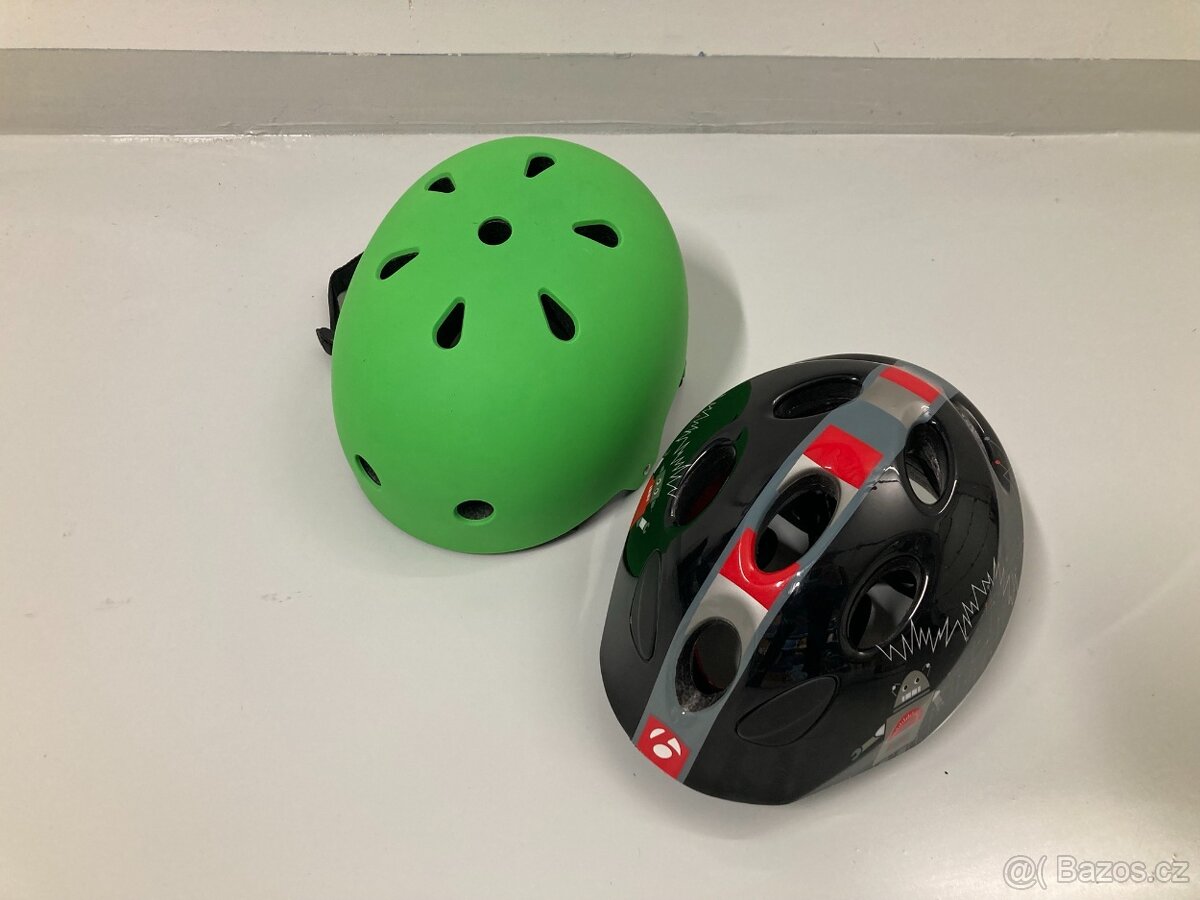 Nová dětská helma Bontrager 46-50 a použitá zelená 53-56