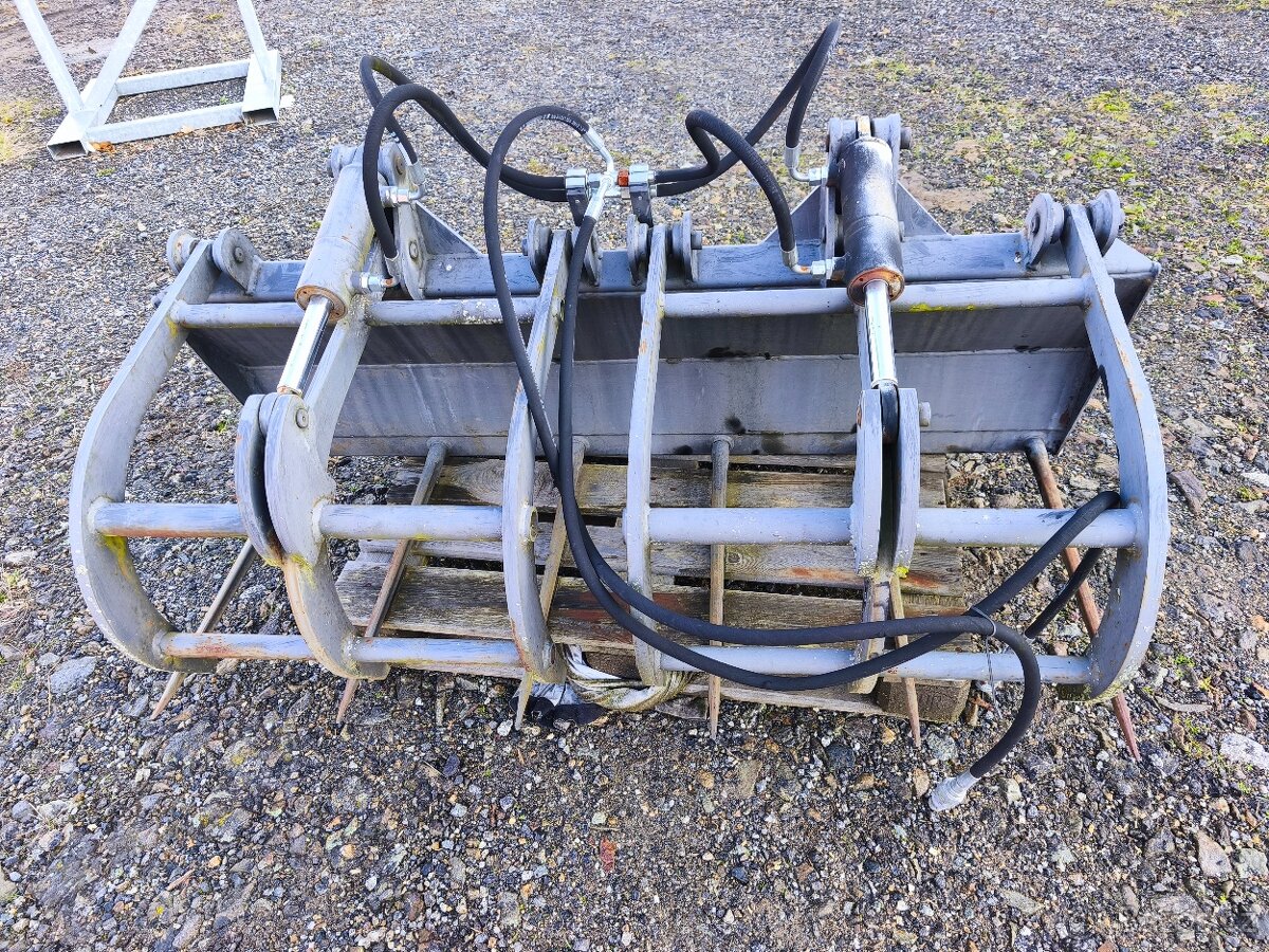 Vidle s přidržovačem.