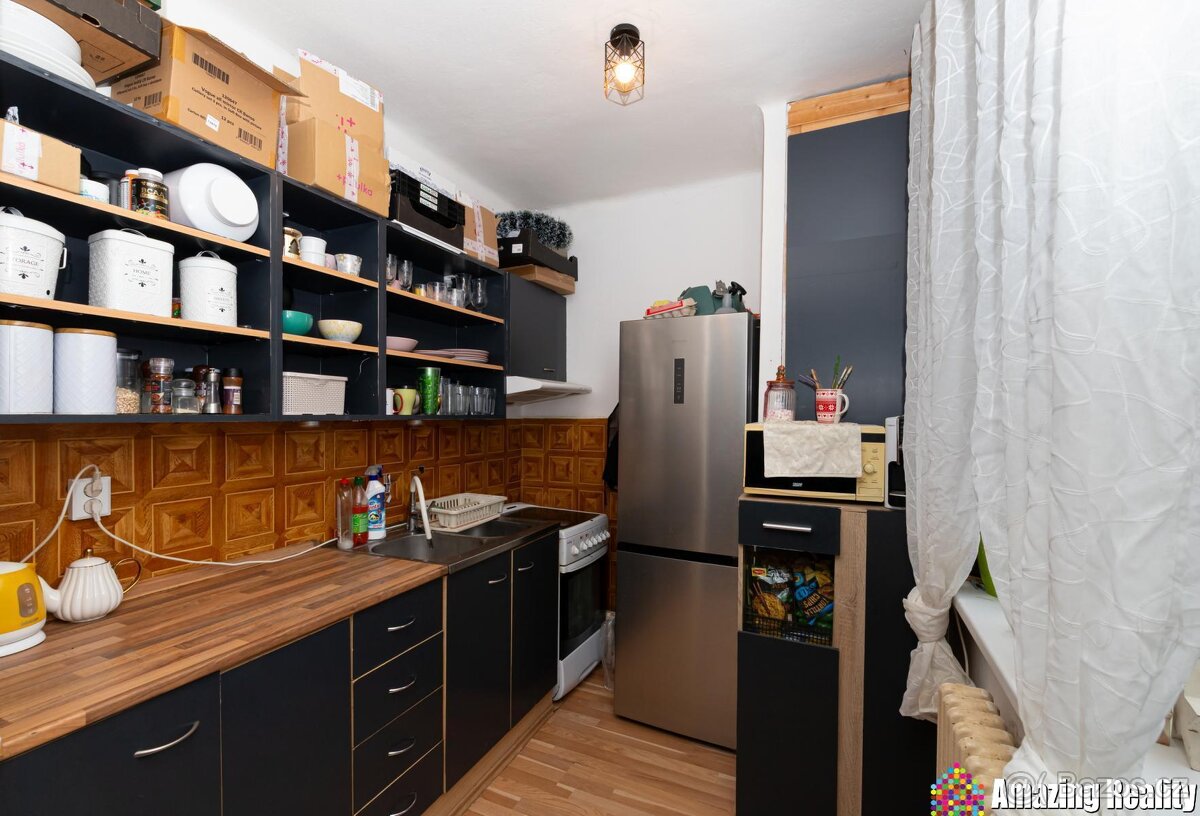 Prodej zděného bytu s plechovou garáží, v obci Mileč