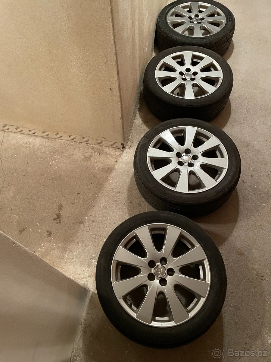 4x Al kola TOYOTA 5x100 + letní pneu Pirelli 215/50/17